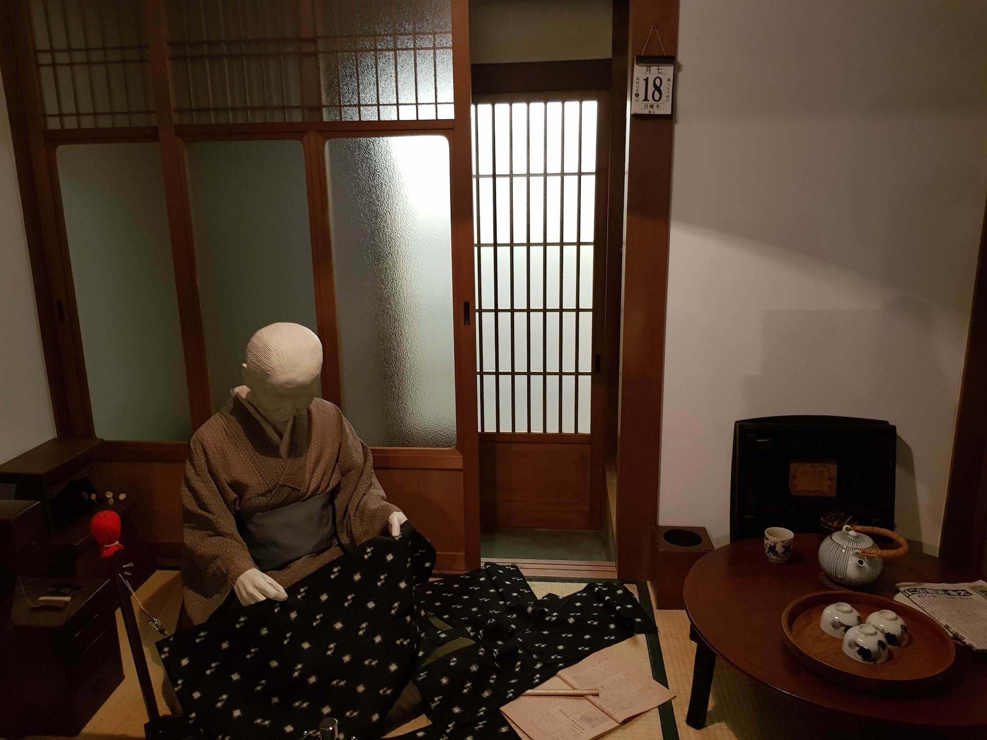 Osaka Museum: Woman working at home